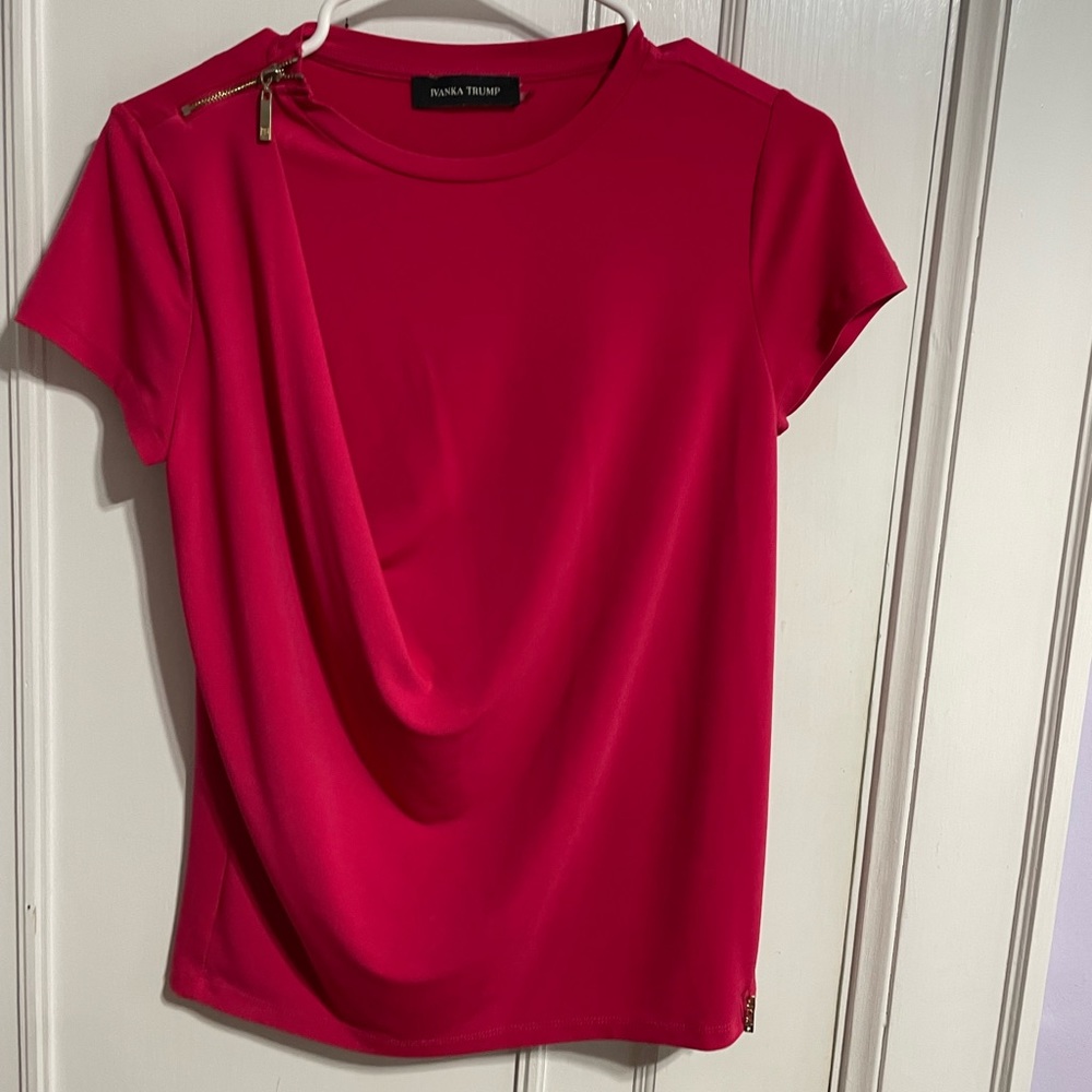 Ivanka Trump absolutely gorgeous, fuchsia blouse. Size extra small.